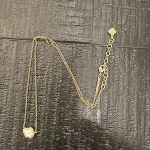 Kendra Scott Small Tessa Pendant Necklace in gold and white mussel